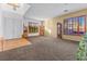 Bright living room with hardwood and carpeted floors at 8728 Burning Hide Ave, Las Vegas, NV 89143