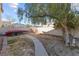 Side yard with a boat and a path at 8728 Burning Hide Ave, Las Vegas, NV 89143