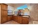 Elegant bathroom with double sinks, ample cabinetry, and a large soaking tub at 8821 Sandspring Dr, Las Vegas, NV 89134