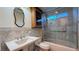 Updated bathroom with walk-in shower, soaking tub, and vanity at 8821 Sandspring Dr, Las Vegas, NV 89134