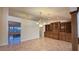 Bright dining room with built-in hutch and chandelier at 8821 Sandspring Dr, Las Vegas, NV 89134