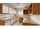 Laundry room with built-in cabinets and workspace at 8821 Sandspring Dr, Las Vegas, NV 89134