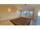 Sunlit living room with tile floors and plantation shutters at 8821 Sandspring Dr, Las Vegas, NV 89134