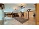 Vaulted ceilings and a spacious living area with tile floors at 8821 Sandspring Dr, Las Vegas, NV 89134