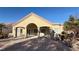 Covered patio with stone pillars and desert landscaping at 8821 Sandspring Dr, Las Vegas, NV 89134