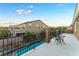 Private balcony overlooking pool and backyard at 8853 Sherborne Gate Ave, Las Vegas, NV 89148