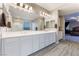 Double vanity bathroom with a view into the bedroom at 8853 Sherborne Gate Ave, Las Vegas, NV 89148