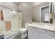 Clean bathroom with walk-in shower and modern vanity at 8853 Sherborne Gate Ave, Las Vegas, NV 89148