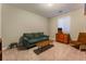 Bedroom with sitting area and ample natural light at 8853 Sherborne Gate Ave, Las Vegas, NV 89148