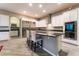 Modern kitchen with stainless steel appliances and a large kitchen island at 8853 Sherborne Gate Ave, Las Vegas, NV 89148