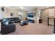 Spacious loft area with large TV and seating at 8853 Sherborne Gate Ave, Las Vegas, NV 89148