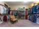 Large walk-in closet with ample shelving and hanging space at 8853 Sherborne Gate Ave, Las Vegas, NV 89148