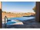 Luxury pool and spa with mountain views and a large patio area at 9316 Provence Garden Ln, Las Vegas, NV 89145