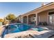 Spacious pool and spa with patio seating at 9316 Provence Garden Ln, Las Vegas, NV 89145