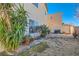 Backyard with plants and a brick patio at 9462 Diamond Bridge Ave, Las Vegas, NV 89166