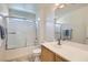 Clean bathroom with shower/tub combo and updated vanity at 9462 Diamond Bridge Ave, Las Vegas, NV 89166