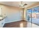 Dining area with hardwood floors, chandelier, and sliding glass doors to patio at 9462 Diamond Bridge Ave, Las Vegas, NV 89166