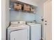 Laundry room with washer, dryer, and shelving at 9462 Diamond Bridge Ave, Las Vegas, NV 89166