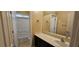 Bathroom with single sink vanity and bathtub at 9490 Alma Ridge Ave, Las Vegas, NV 89178