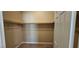 Walk-in closet with shelves and hanging rods at 9490 Alma Ridge Ave, Las Vegas, NV 89178