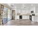 Modern kitchen with white cabinets and subway tile backsplash at 9516 Walking Spirit Ct, Las Vegas, NV 89129