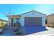 One story home with two car garage and front patio at 9577 Among Ln, Las Vegas, NV 89143