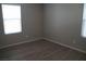 Bright bedroom with neutral walls and wood-look flooring at 1023 Desert Dome Ave, North Las Vegas, NV 89086