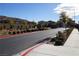 Gated community entrance with well-manicured landscaping at 1023 Desert Dome Ave, North Las Vegas, NV 89086