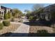 Landscaped community with a walking path and well-maintained yards at 1023 Desert Dome Ave, North Las Vegas, NV 89086