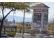 Shopping center entrance sign with various stores listed at 1023 Desert Dome Ave, North Las Vegas, NV 89086