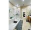 Large bathroom with walk-in shower and access to the walk-in closet at 10328 Planter Box St, Las Vegas, NV 89178