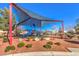 playground with shade structure and play equipment at 10546 Hartford Hills Ave, Las Vegas, NV 89166