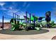 Modern playground structure with shade canopies and slides at 10546 Hartford Hills Ave, Las Vegas, NV 89166