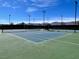 Well-maintained tennis courts with mountain backdrop at 10546 Hartford Hills Ave, Las Vegas, NV 89166