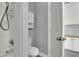 Small bathroom with shower and white tile at 1138 Aspen Valley Ave, Las Vegas, NV 89123