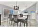 Elegant dining room with a chandelier and modern furnishings at 1138 Aspen Valley Ave, Las Vegas, NV 89123