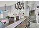 Spacious dining room with chandelier and view into game room at 1138 Aspen Valley Ave, Las Vegas, NV 89123