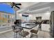 Spacious kitchen with island, stainless steel appliances, and white cabinets at 1138 Aspen Valley Ave, Las Vegas, NV 89123