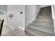 Elegant carpeted staircase leading to the upper level at 1138 Aspen Valley Ave, Las Vegas, NV 89123