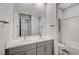 Modern bathroom with double vanity and shower at 11870 Star Grass Ave, Las Vegas, NV 89138