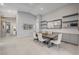 Elegant dining room with a large wooden table and six cushioned chairs at 11870 Star Grass Ave, Las Vegas, NV 89138