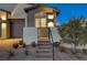 Front entry with a modern gate and steps leading to the house at 11870 Star Grass Ave, Las Vegas, NV 89138