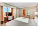 Bedroom with a desk, large window with city view and attached bathroom at 125 E Harmon Ave # 1620, Las Vegas, NV 89109