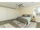 Spacious main bedroom with large closet and wood-look flooring at 1409 Denver St, Boulder City, NV 89005