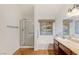 Bathroom with granite vanity, shower, and bathtub at 1420 Ellen Tracy Way, Henderson, NV 89014