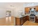 Kitchen with granite countertops and stainless steel appliances at 1420 Ellen Tracy Way, Henderson, NV 89014