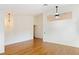 Living room with hardwood floors and a high ceiling at 1420 Ellen Tracy Way, Henderson, NV 89014