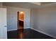 Bedroom with dark hardwood floors and access to a bathroom at 150 N Las Vegas Blvd # 1217, Las Vegas, NV 89101