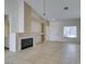 Living room with tile floors, fireplace, and built-in shelving at 162 Windy Creek Ave, Las Vegas, NV 89123