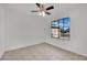 Bright bedroom with tile flooring and ceiling fan at 1627 Candice St, Las Vegas, NV 89156